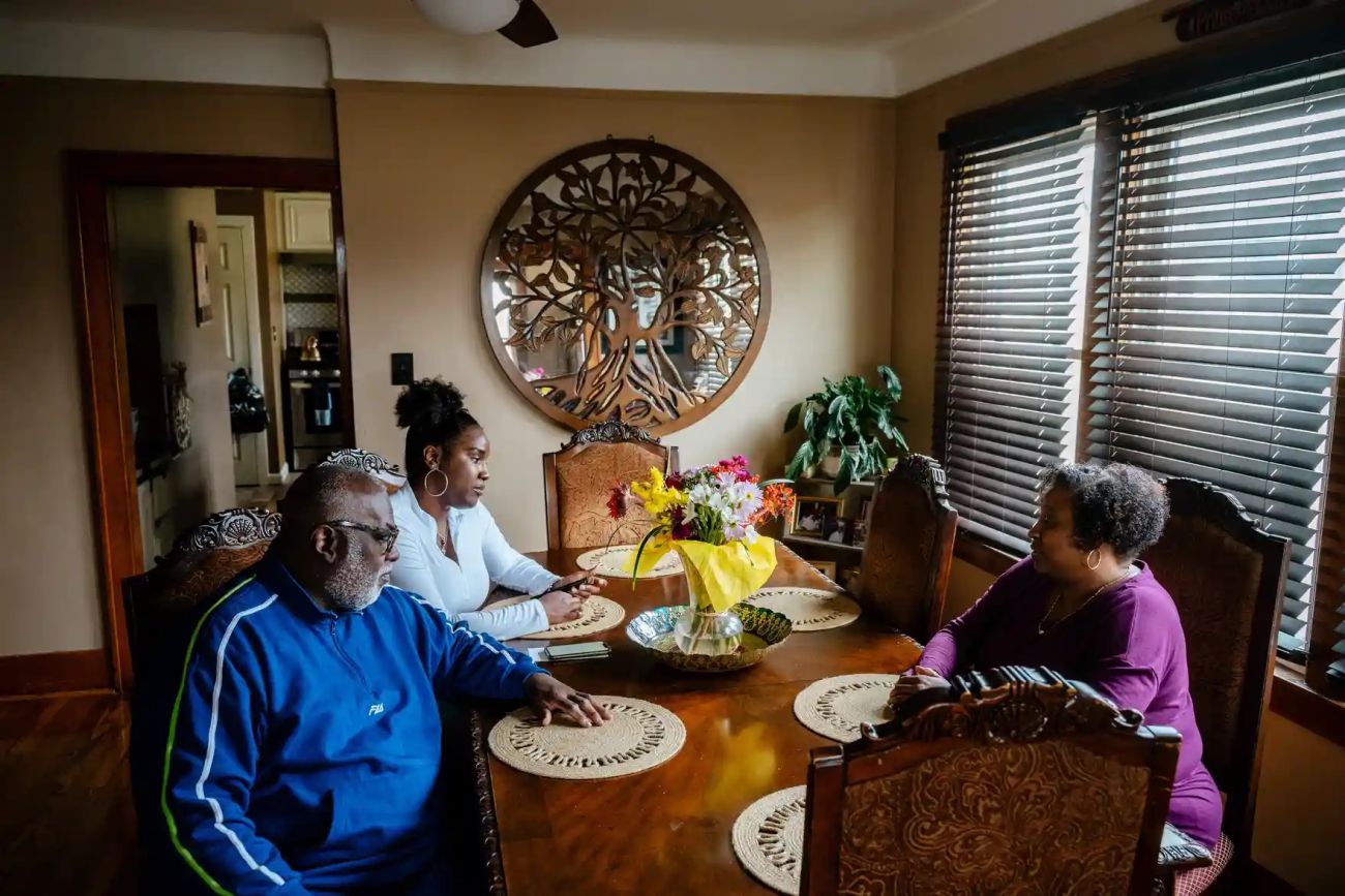 family sitting around table