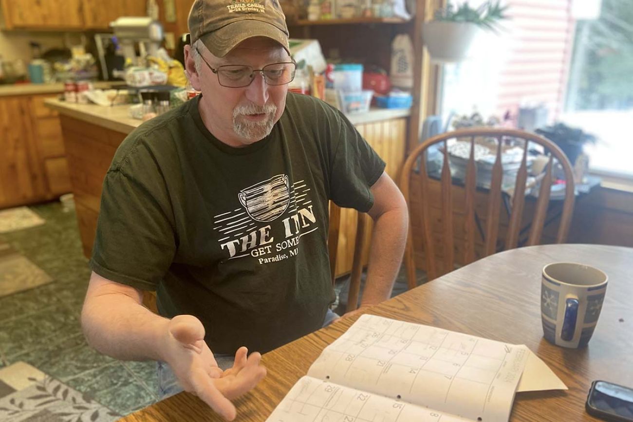 man sitting a table