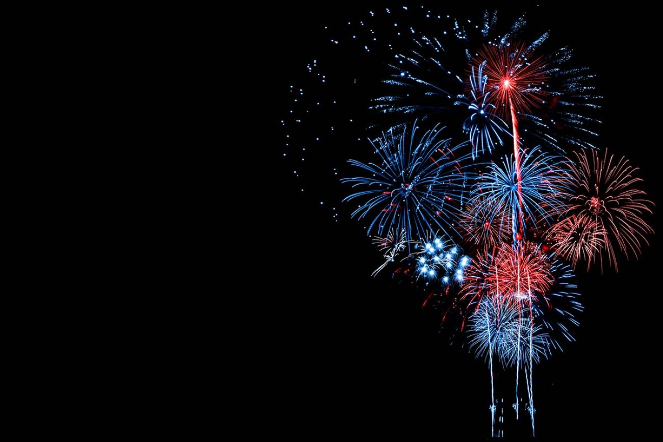 Red and Blue Fireworks in the night sky