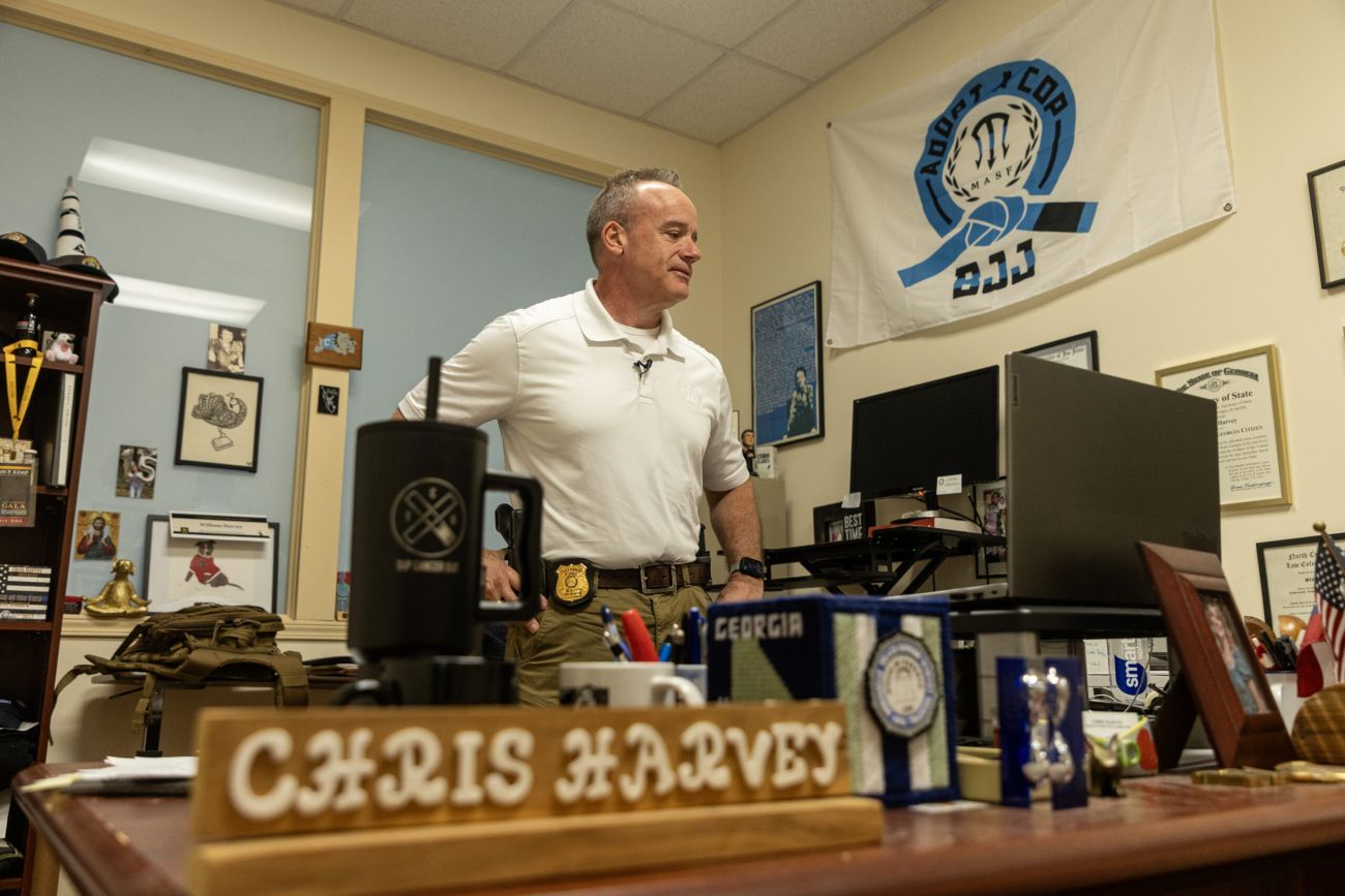 Chris Harvey standing in his office