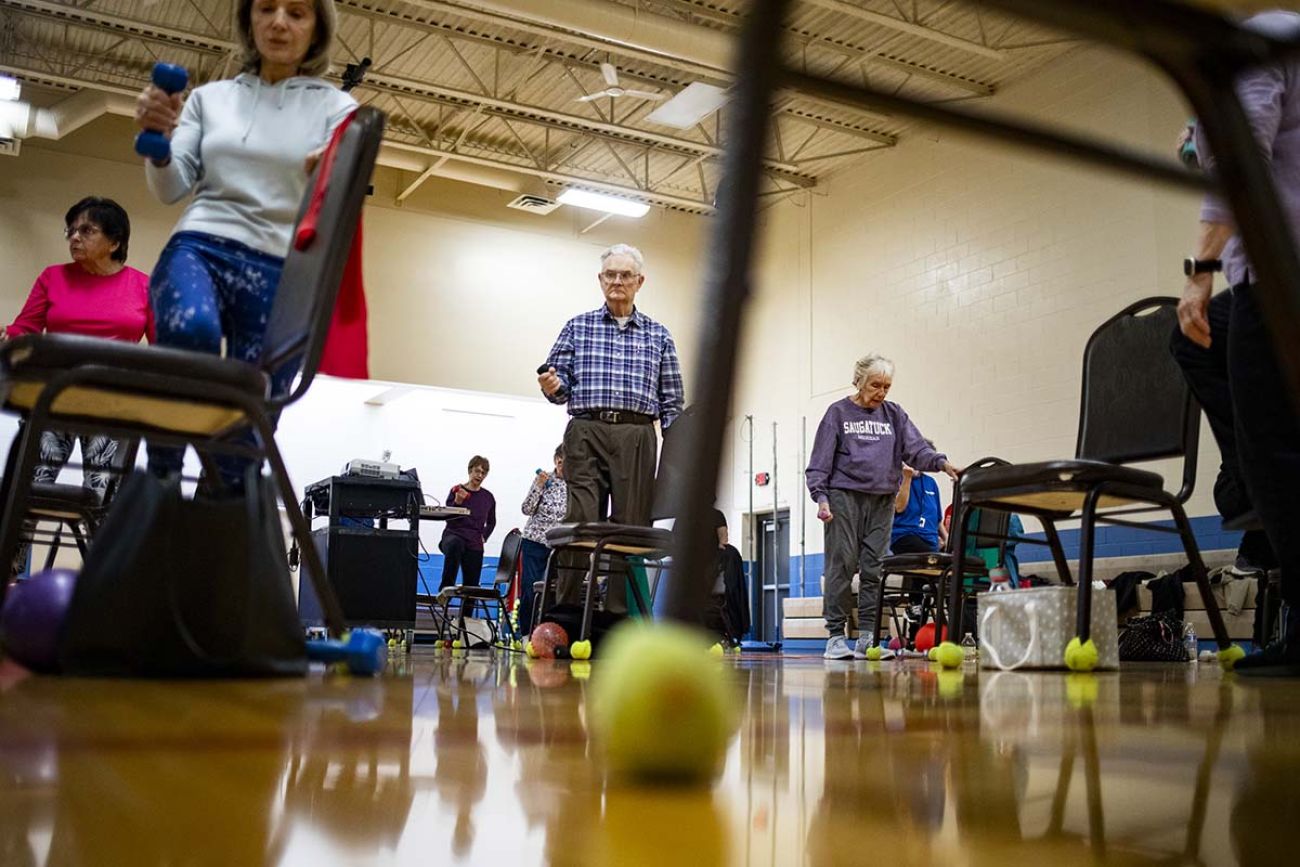 Seniors in a big room for an exercise class at the Clinton Township Senior Center in Michigan