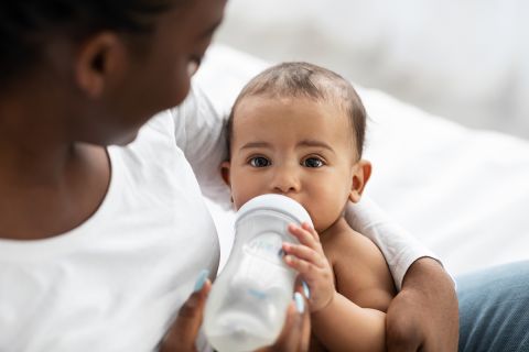 baby drinking out of bottle