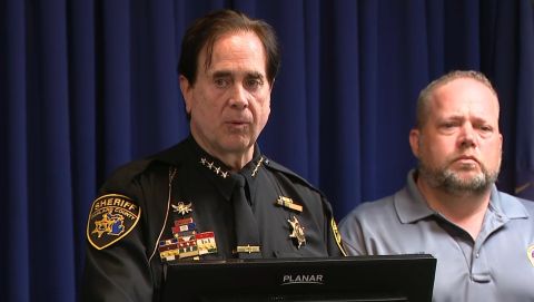 screenshot of Oakland County sheriff Michael Bouchard and the mayor of Rochester Hills at the podium at a June 15 press conference