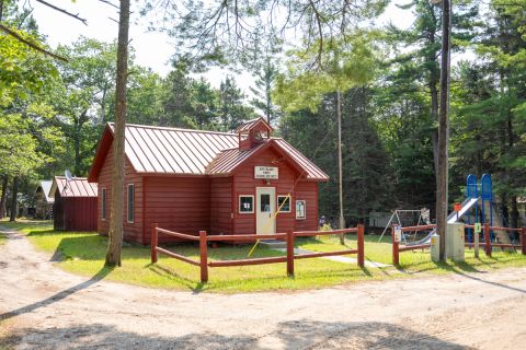 Bois Blanc Pines School. A small red building