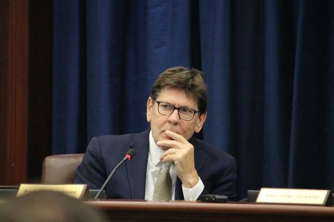 Board of State Canvassers Vice Chair Richard Houskamp sitting at a table