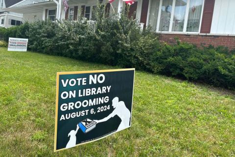 A sign that says "Vote No on Library Grooming" 