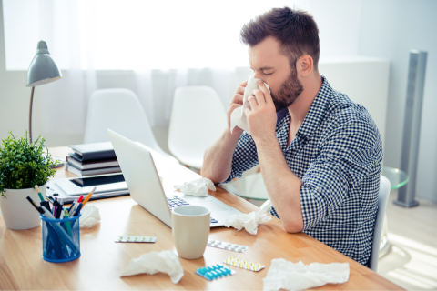 Sick worker in office