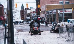 snowmobile on a snow-covered street