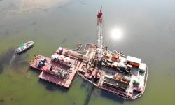 Aerial shot of oil rig in water