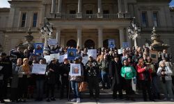 Proponents of “second look” standing in front of the Michigan Capitol building