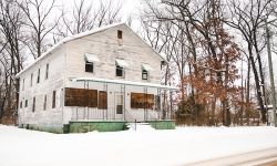 A white building that was once the Oh Dear’s hotel in Michigan. 